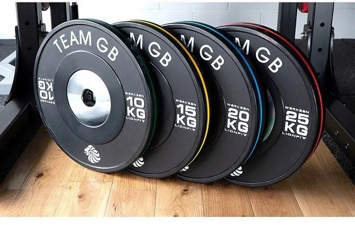 Row of black plates with coloured rim stripes